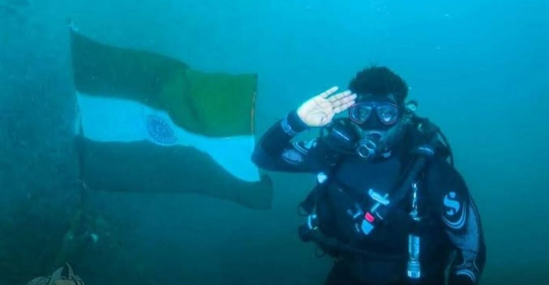 flag hoisting under water